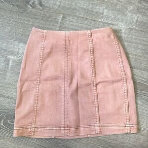 Pink Free People mini skirt. Stretchy material. Form flattering.
